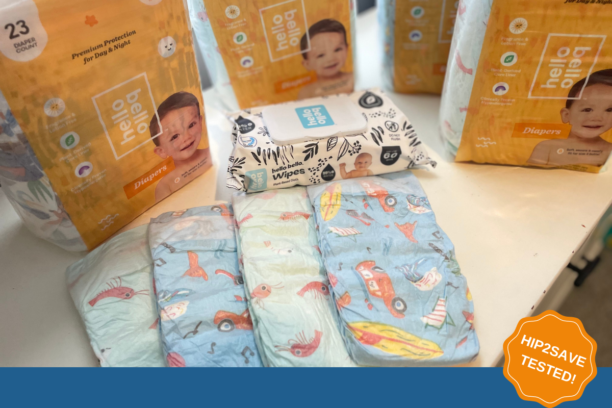 Image of blue and green Hello Bello Diapers with cars and lobsters on them next to Hello Bello wipes and packaged diapers