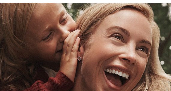 Mother and child laughing