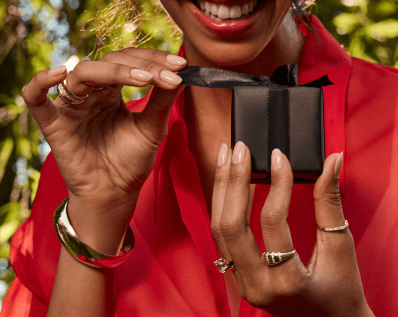 Smiling woman with gift