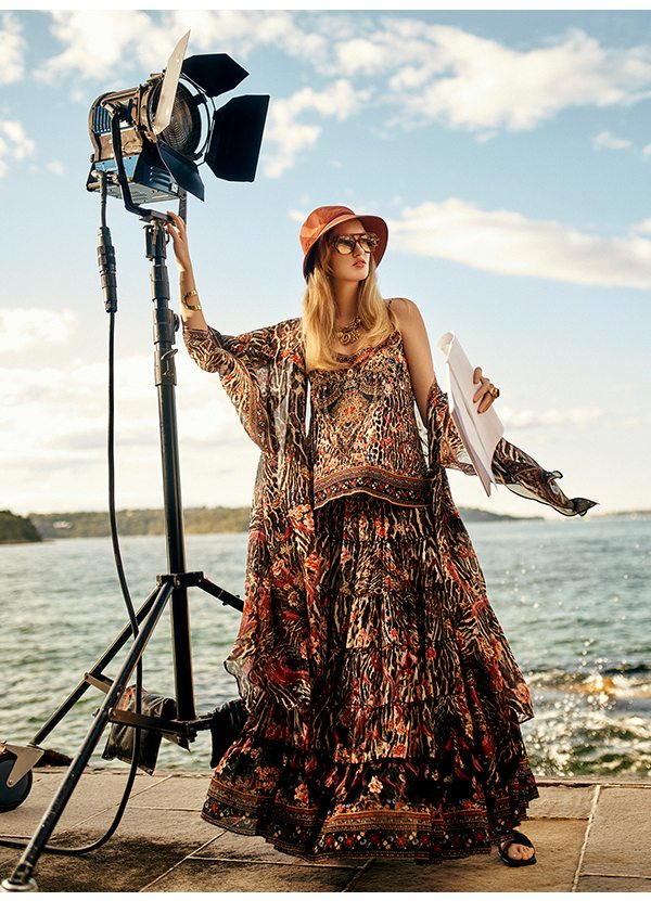 Model in animal print and pink floral maxi skirt, shoestring top & layering piece