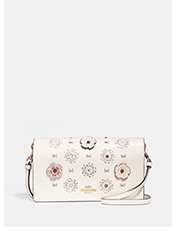 Foldover Crossbody Clutch With Cut Out Tea Rose | White foldover crossbody bag with flower print