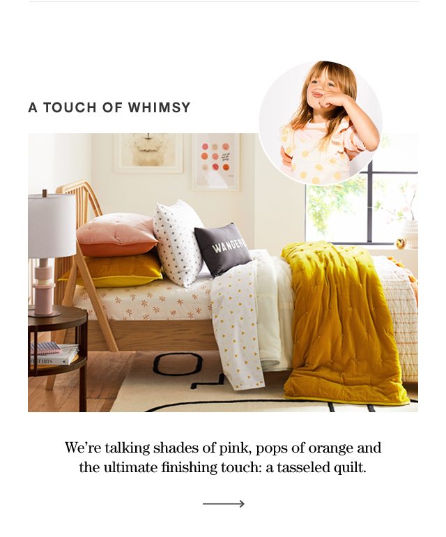 TOUCHES OF WHIMSY We’re talking shades of pink, pops of orange and the ultimate finishing touch: a tasseled quilt.
