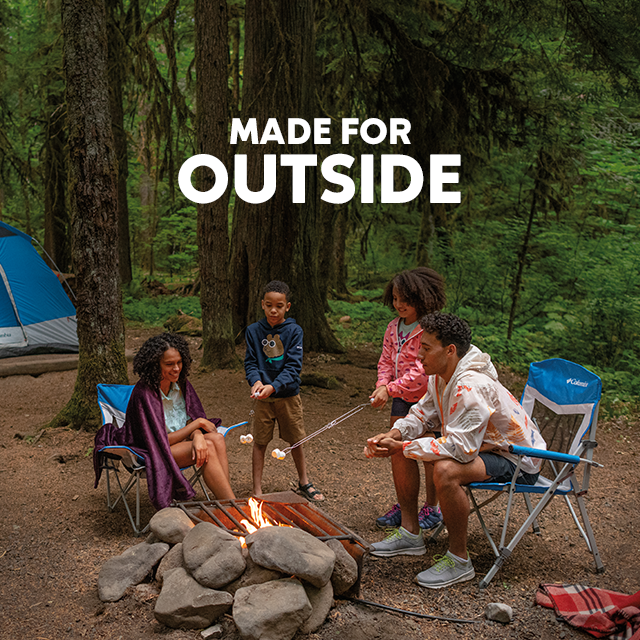Made for Outside. Family roasting smores at a campfire.