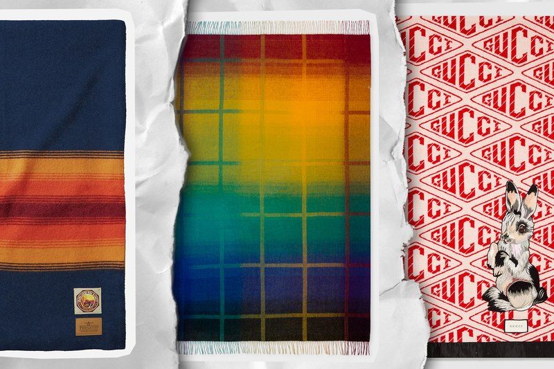 A collection of multicolored blankets on a paper background