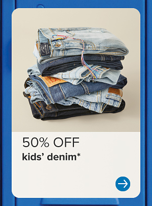 Image of a stack of folded jeans. 50% off kids' denim. 