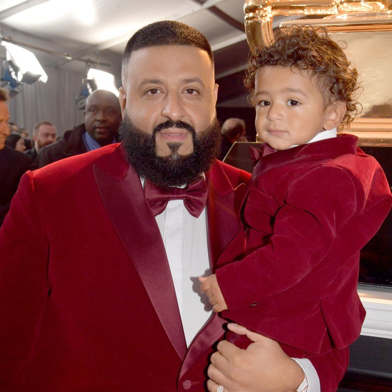 DJ Khaled in a beard with his son Asahd and his curly hair.