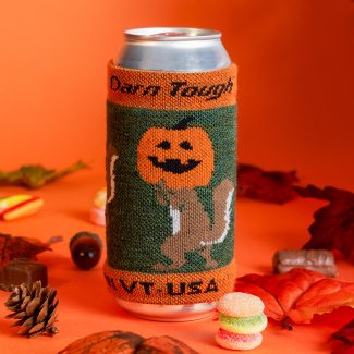 Shop Now - a knit can sleeve featuring a squirrel wearing a jack-o-lantern on its head