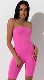 Whoa Nelly Strapless Romper is a ribbed knit, stretch fabric based romper complete with a strapless neckline, bodycon fit, slip on design and above the knee bottom hem.