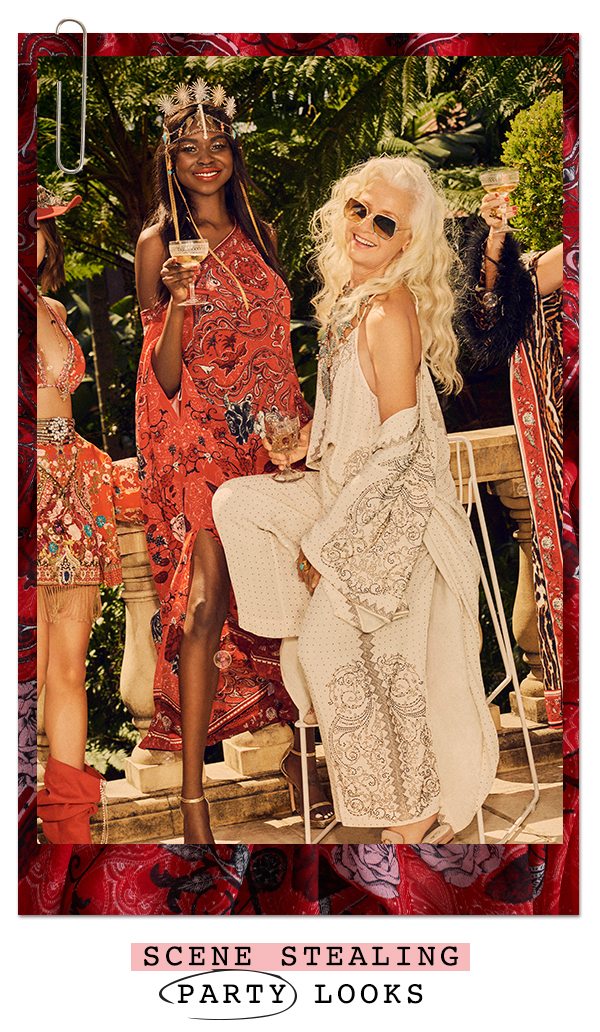 Scene Stealing Party Looks | Sarah Jane Adams and Yia Yia at party wearing red kaftan and embellished cream outfit.