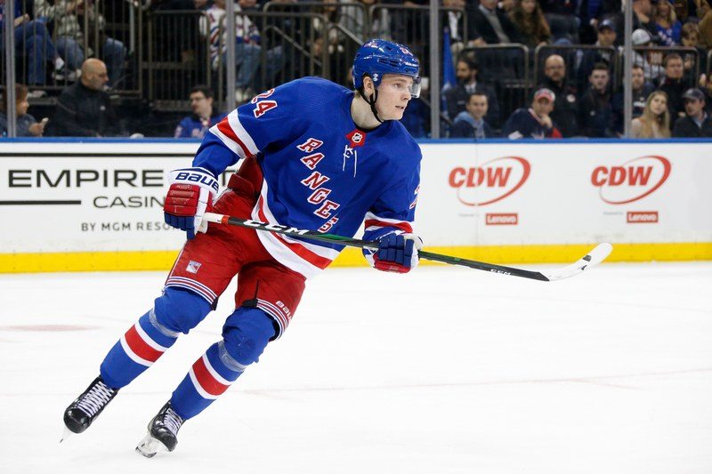 Image may contain: Kaapo Kakko, Human, Person, Helmet, Clothing, Apparel, People, Team Sport, Hockey, Sport, Sports, Team, and Rink