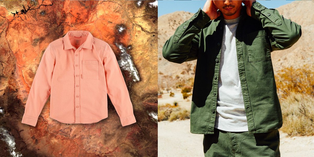 A MAN WEARING AN OLIVE DIRT SHIRT AND A PEACH DIRT SHIRT