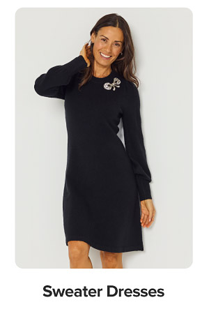 Image of a woman wearing a black dress. Sweater dresses.