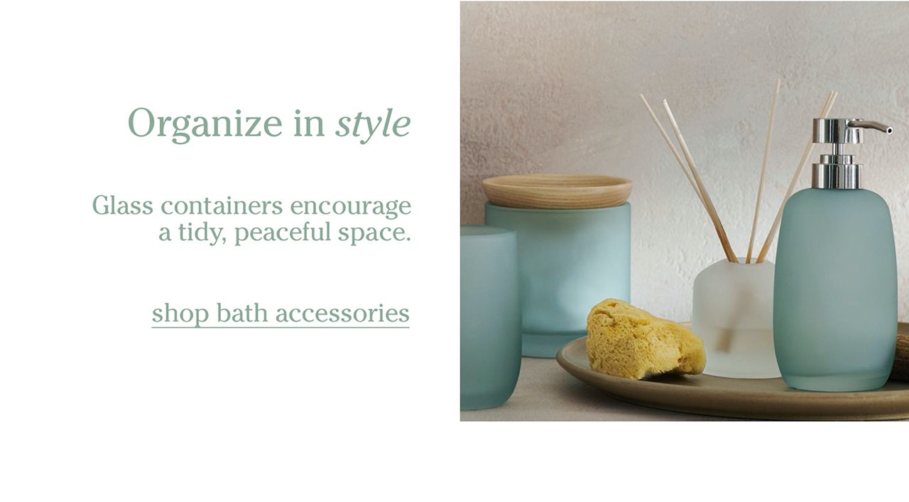 Organize in style. Glass containers encourage a tidy, peaceful space. shop bath accessories