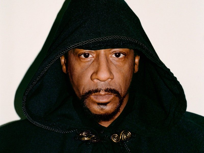 Image may contain: Katt Williams, Fashion, Clothing, Hood, Face, Head, Person, Photography, Portrait, Adult, and Hoodie