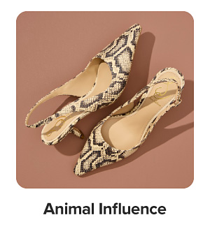 Leopard print high heels. Animal influence.