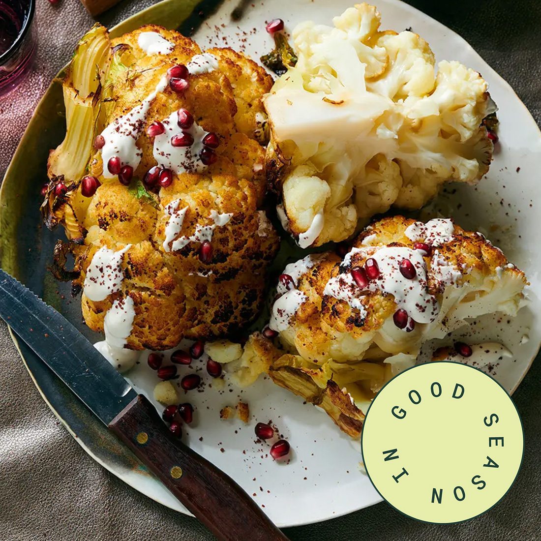 Whole Roasted Cauliflower with Tahini, Yogurt, and Pomegranate
