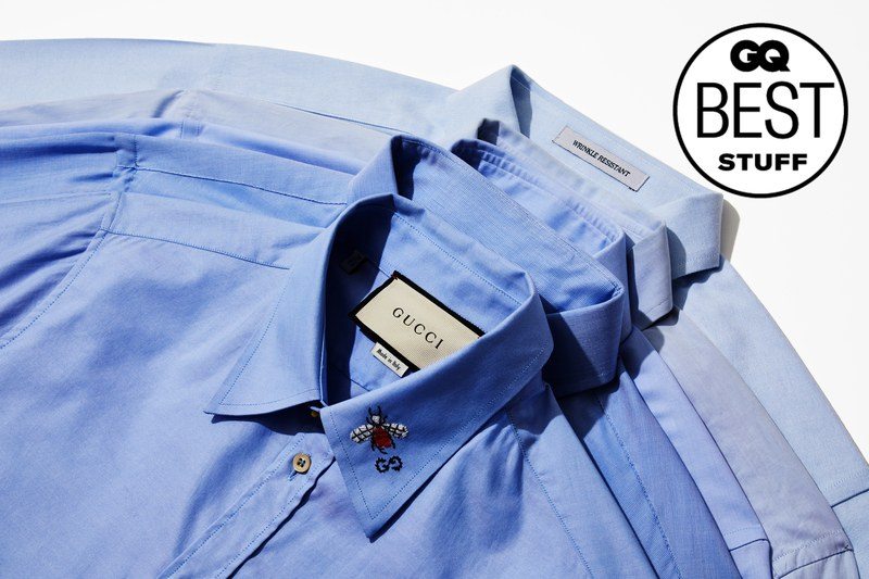 Four blue shirts stacked on top of each other