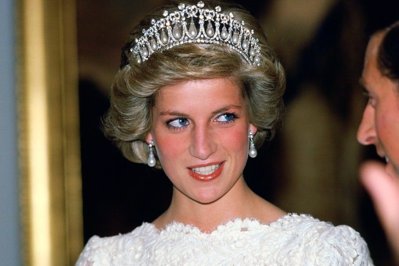 Diana, Princess Of Wales, Talking To Her Husband, During A Visit To The British Embassy. The Princess Is Wearing A Taffeta And Lace Gown With A Scalloped Neckline Designed By Murray Arbeid With Queen Mary's Diamond And Pearl Tiara, A Present From The Queen.
