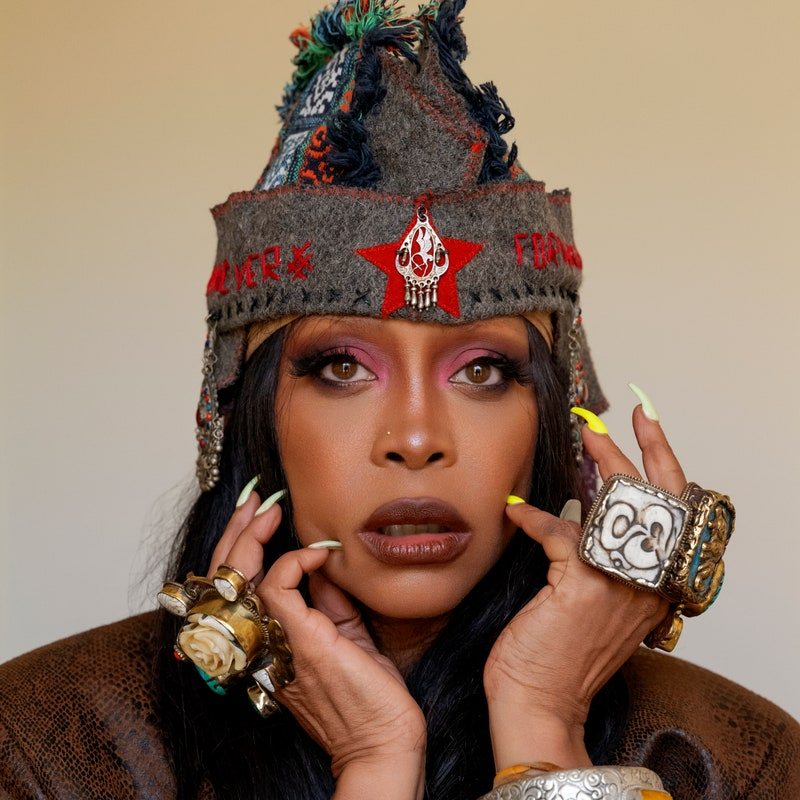 Image may contain: Erykah Badu, Adult, Person, Wedding, Accessories, Jewelry, Body Part, Finger, Hand, Ring, and Ornament