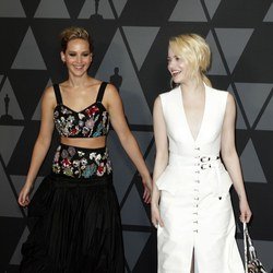 Jennifer Lawrence and Emma Stone in blonde updos.