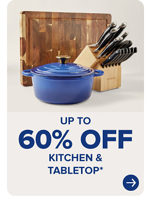 A wooden cutting board, cutlery set and a blue Dutch over. Up to 60% off kitchen and tabletop.