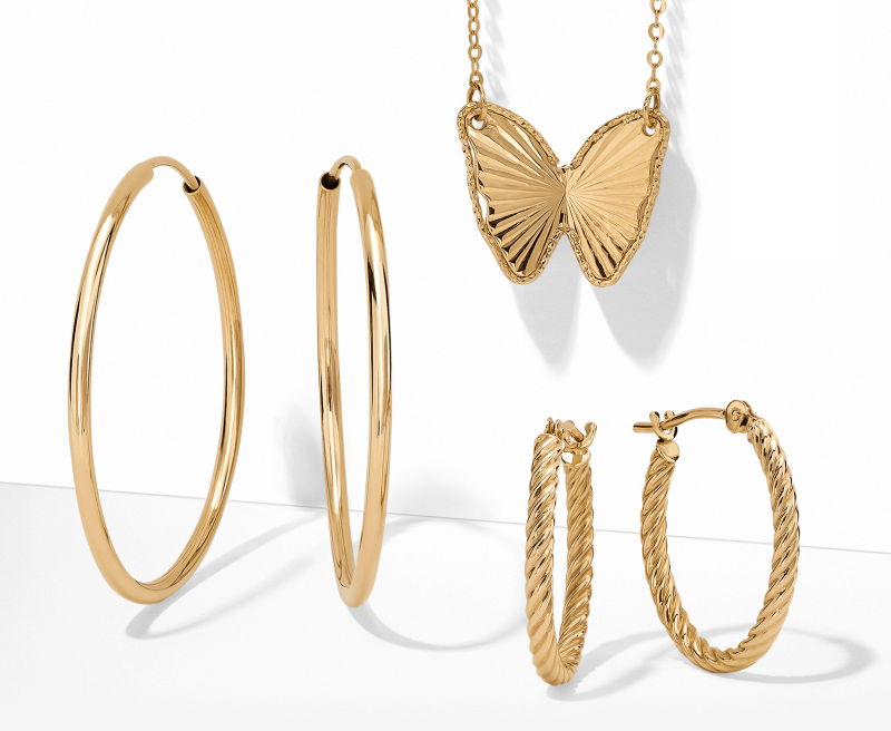 Image of Stunning Gold Jewelry, Including a Butterfly Necklace, Continuous Hoop Earrings, and Hollow Oval Twist Hoop Earrings