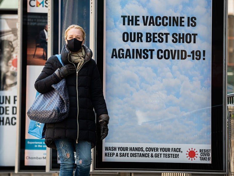 Image may contain: Clothing, Apparel, Human, Person, Pants, Advertisement, Poster, and Billboard