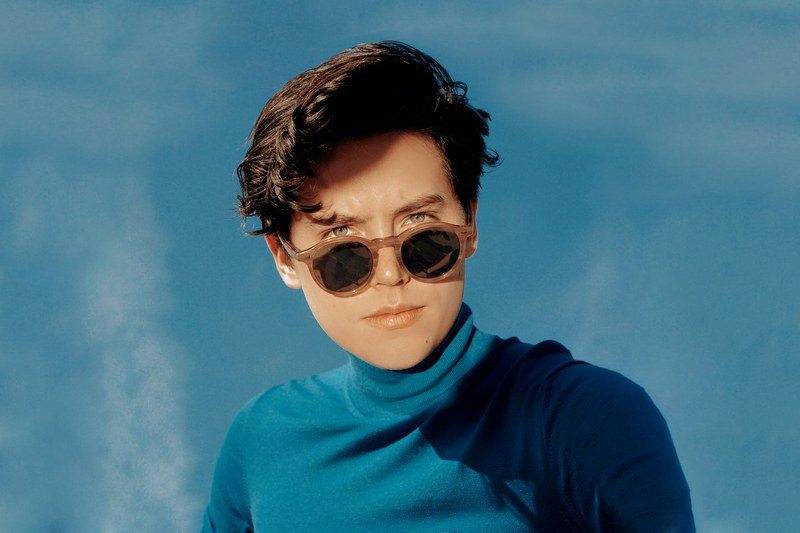 cole sprouse peeking eyes out from sunglasses