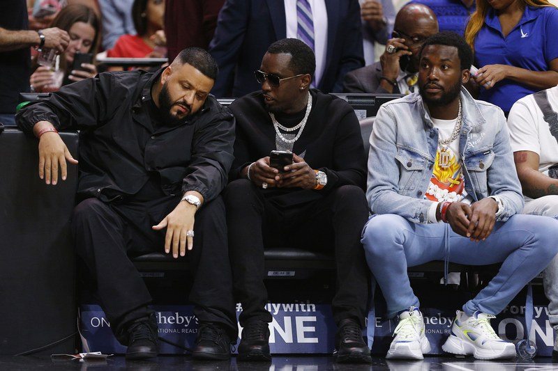 MIAMI, FLORIDA - JANUARY 02: DJ Khaled, Sean %22Diddy%22 Combs and Meek Mill attend the game between the Miami Heat and the Toronto Raptors at American Airlines Arena on January 02, 2020 in Miami, Florida. NOTE TO USER: User expressly acknowledges and agrees that, by downloading and/or using this photograph, user is consenting to the terms and conditions of the Getty Images License Agreement. (Photo by Michael Reaves/Getty Images)