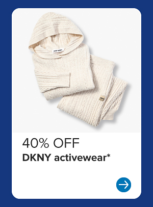 A cream colored activewear set. 40% off DKNY activewear.