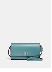 Phone Crossbody | light blue coach crossbody bag with silver coach logo