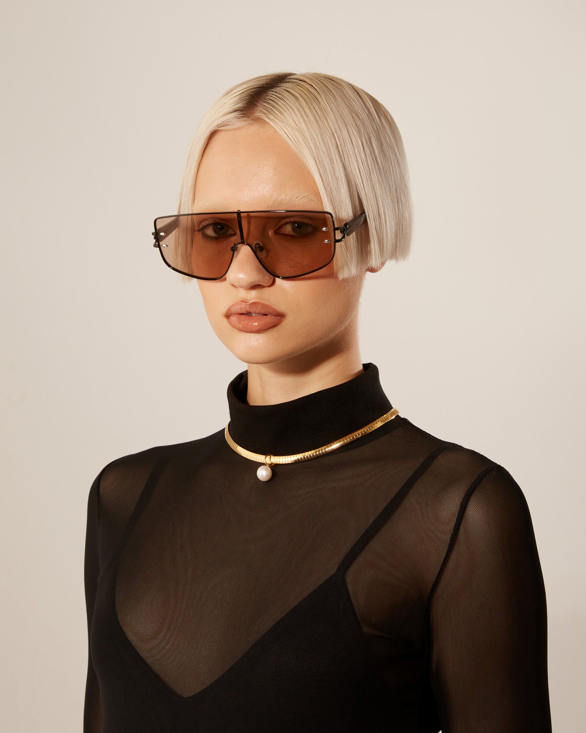 Model wearing the Flare Sunglasses