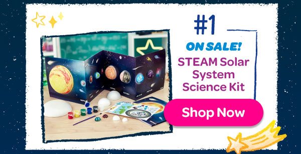 STEAM Solar System Science Kit, with assorted paints, foam balls, and instruction sheet laid out on a wooden table