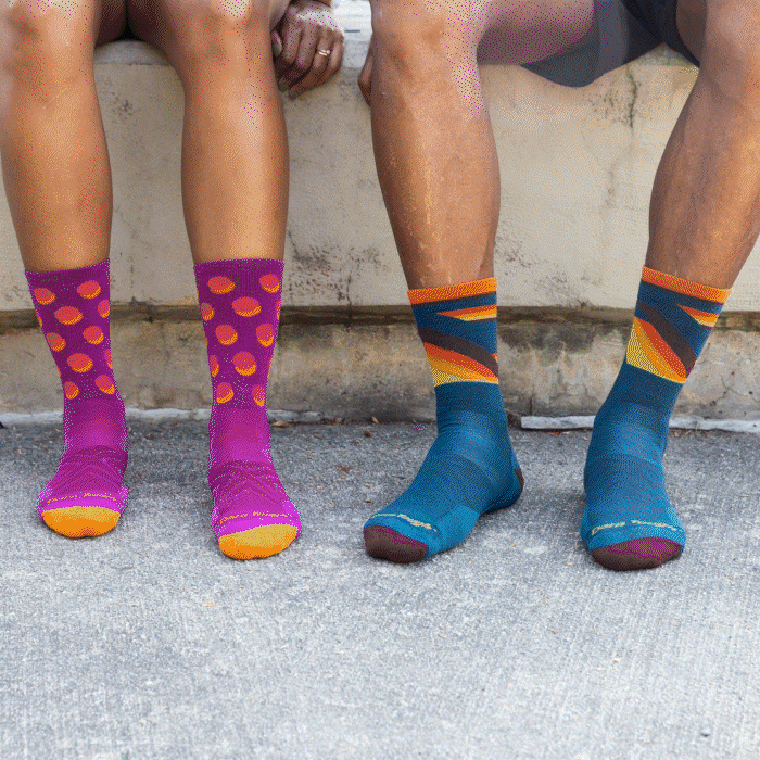 Runners wearing Darn Tough running socks - blue ones, black ones, pink ones, and road runner ones. Lookin' good.