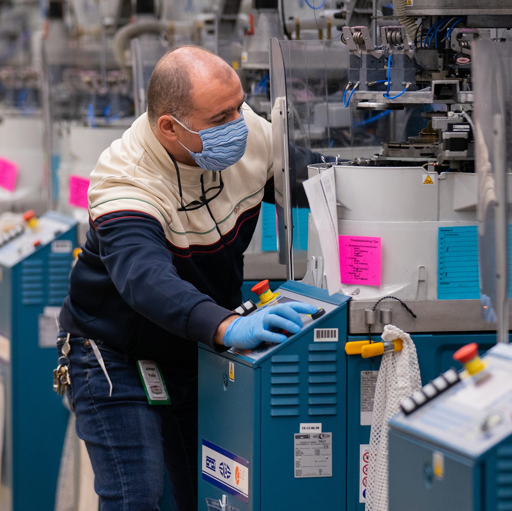 Adman is more than essential. Pictured here working up one of knitting machines after it was dormant for a bit, this guy crushes when it comes to making a machine hum.