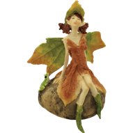 Fairy on Rock with Frog Statue