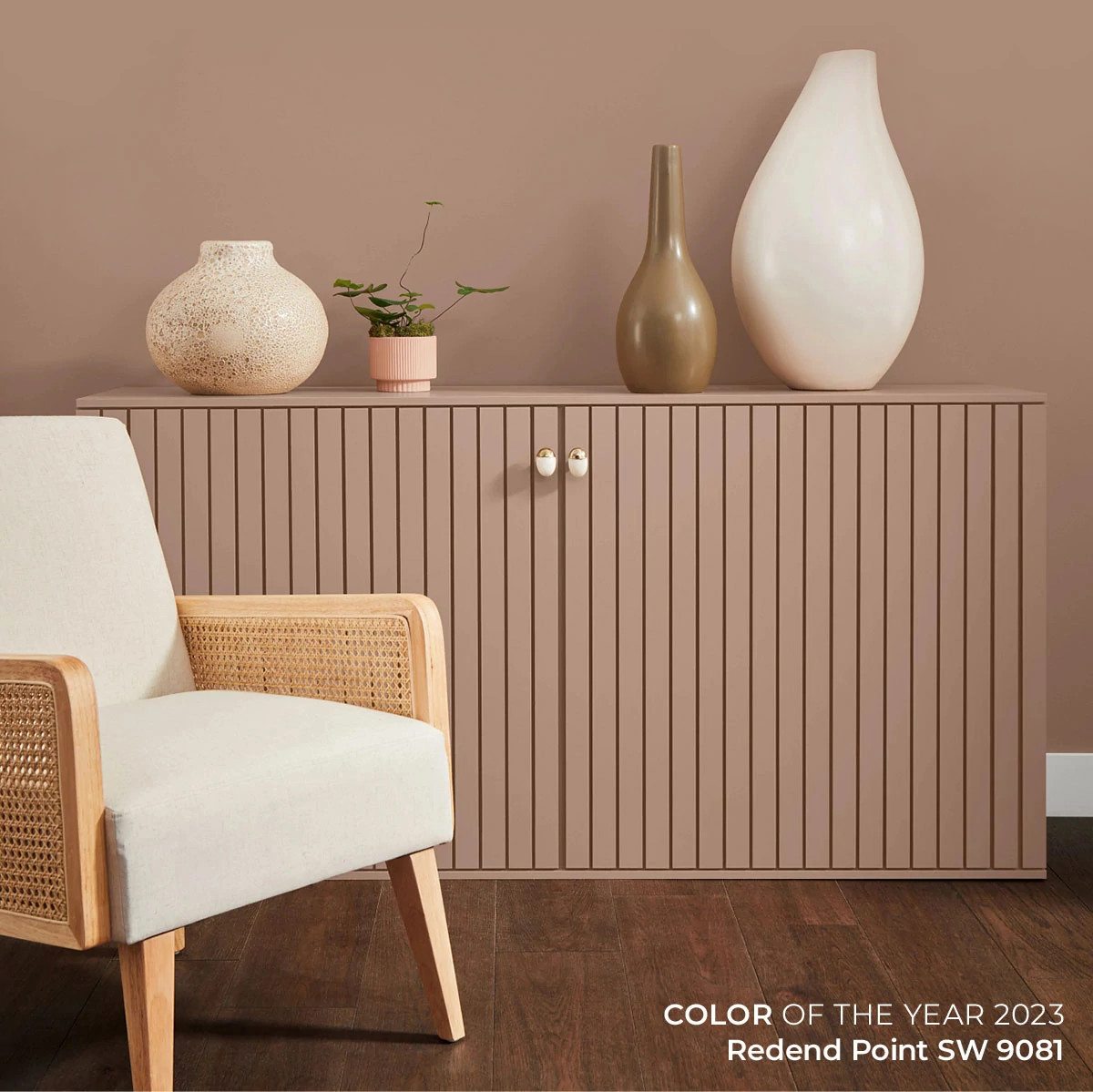 A room painted in Color of the Year 2023 Redend Point SW 9081.
