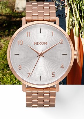 Nixon arrow sale rose gold