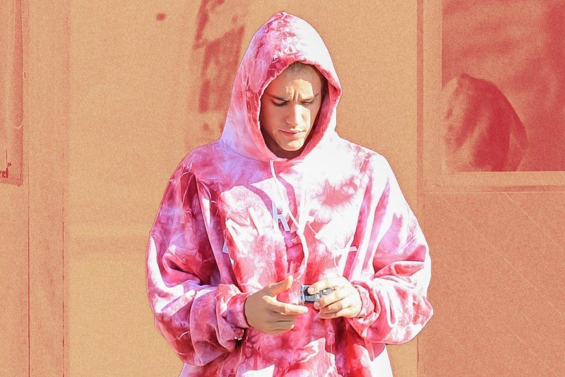 Justin Bieber in chino pants and tie dye hoodie