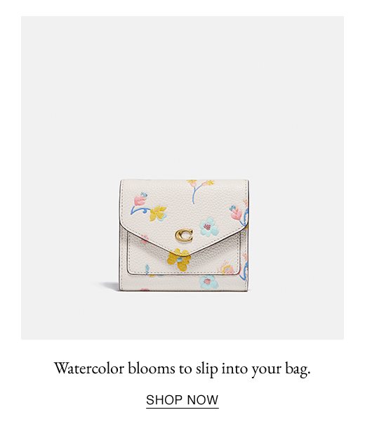 Watercolor blooms to slip into your bag. SHOP NOW