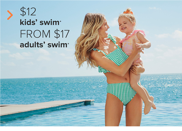 A woman in a green and white striped two piece swimsuit holds her daughter, who wears a pink swimsuit with ruffles. $12 kids' swim, from $17 adults' swim.