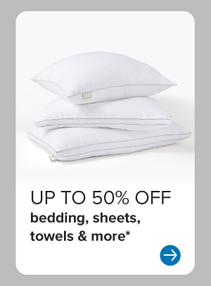 Three white pillows. Up to 50% off bedding, sheets, towels & more*