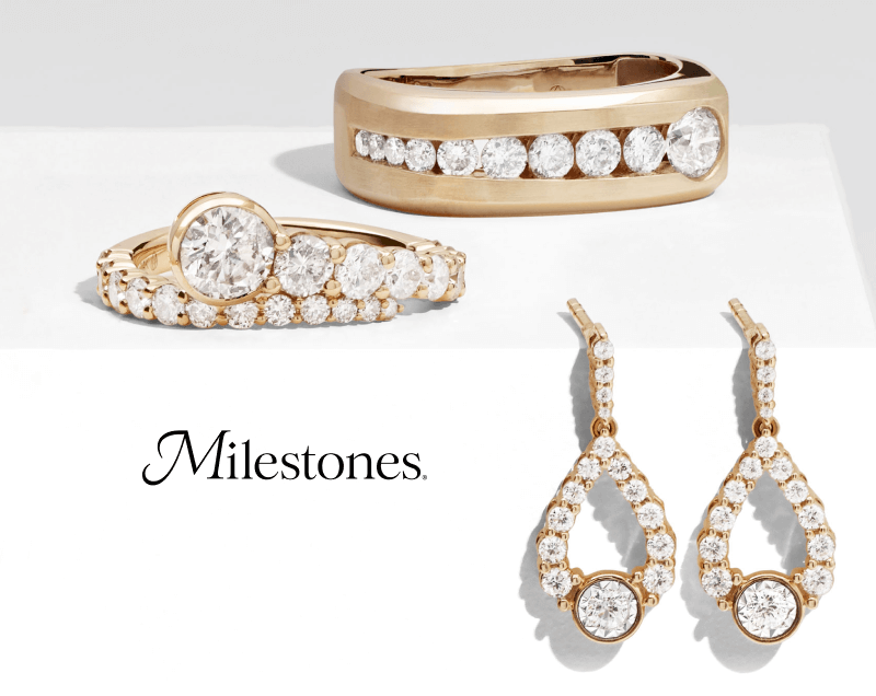 Collection of stunning Milestones® jewelry, including earrings and two rings