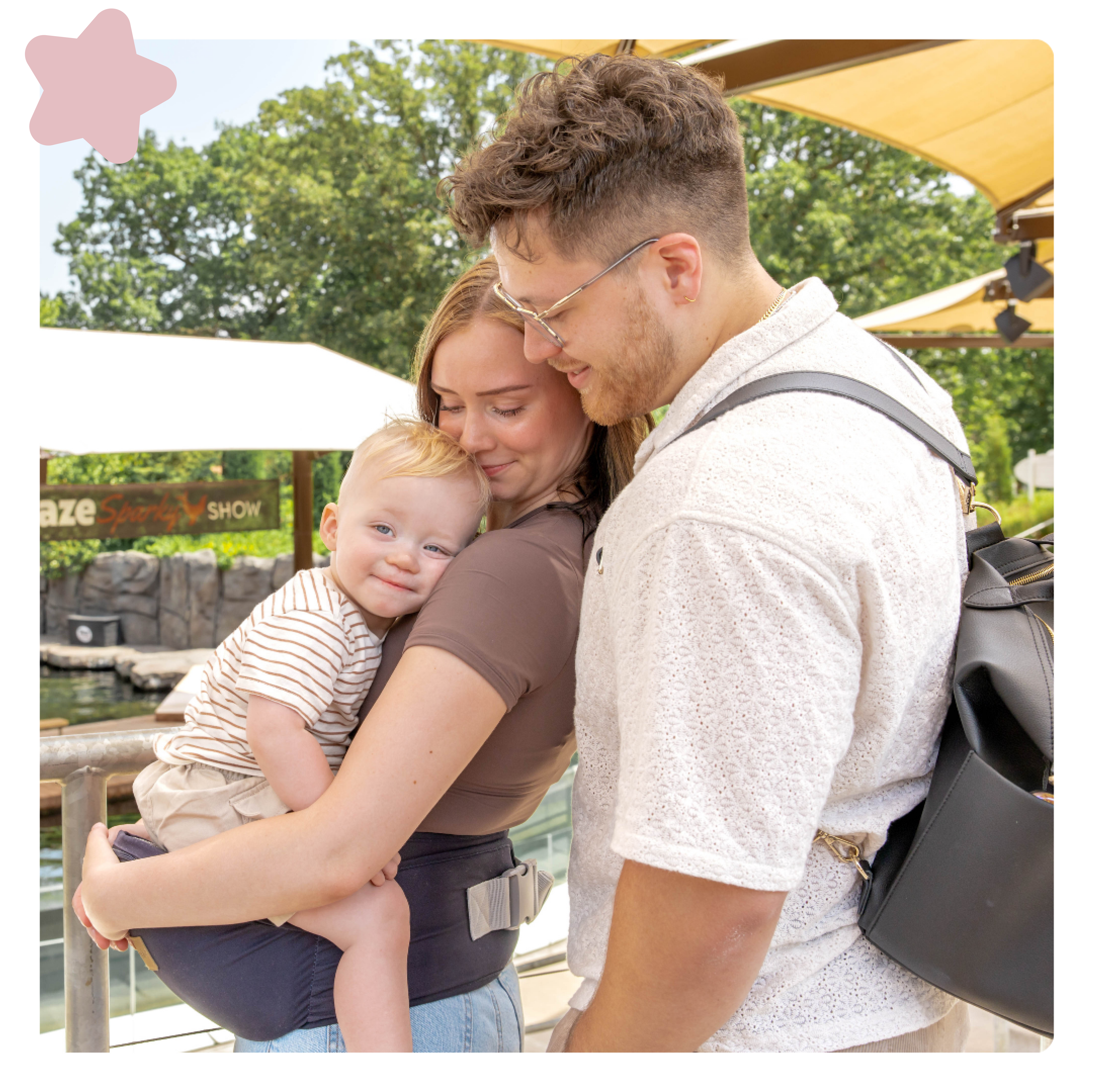 Toddler Resting on Mom while sitting on the Baby Hip Seat + Support