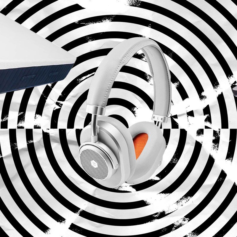 A mattress, a pair of headphones, and a juicer on black and white spiral background