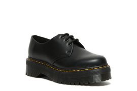 A black platform loafer.