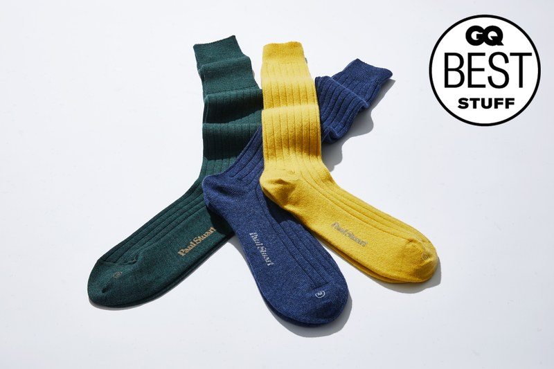 Three socks sitting on a white background