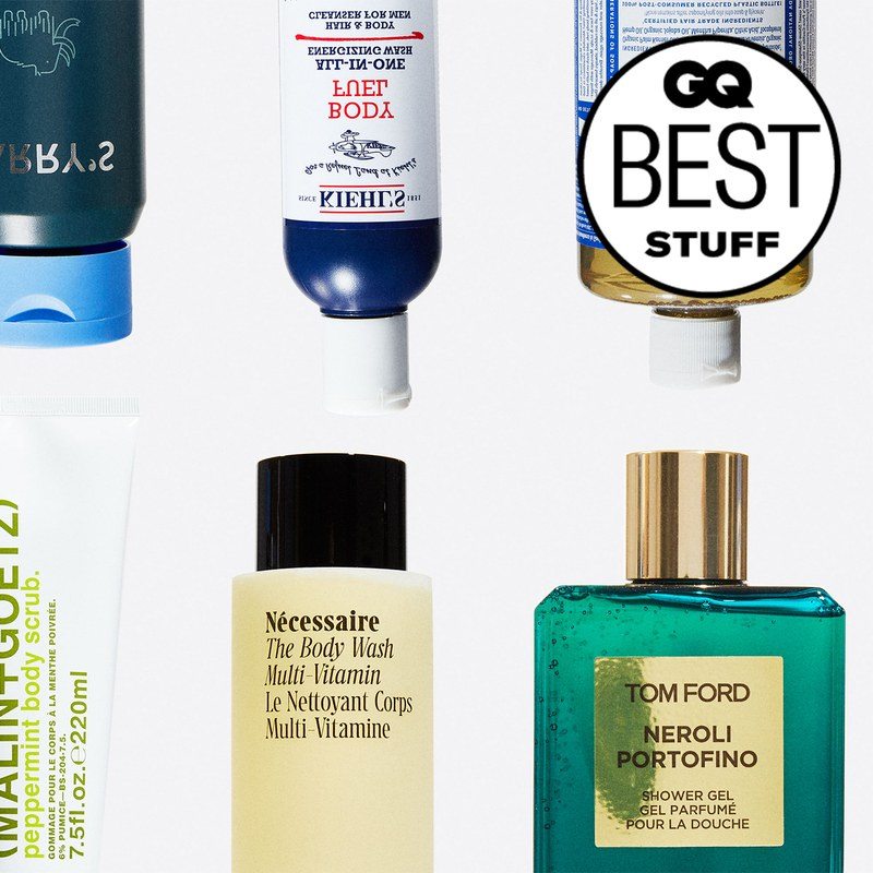 A bunch of different kinds of body washes on a white background