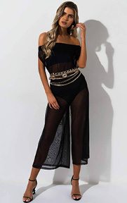 Up To Something Mesh Jumpsuit is a completely sheer, mesh based one piece jumpsuit complete with a sleeveless design, ultra wide leg fit and super stretchy, fabric base.