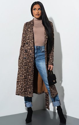Don’t Front Faux Suede Leopard Trench Coat is a faux suede based, long sleeved trench coat complete with an allover, classic leopard print pattern, midi length, folded collar, buttoned front and matching tie belt.